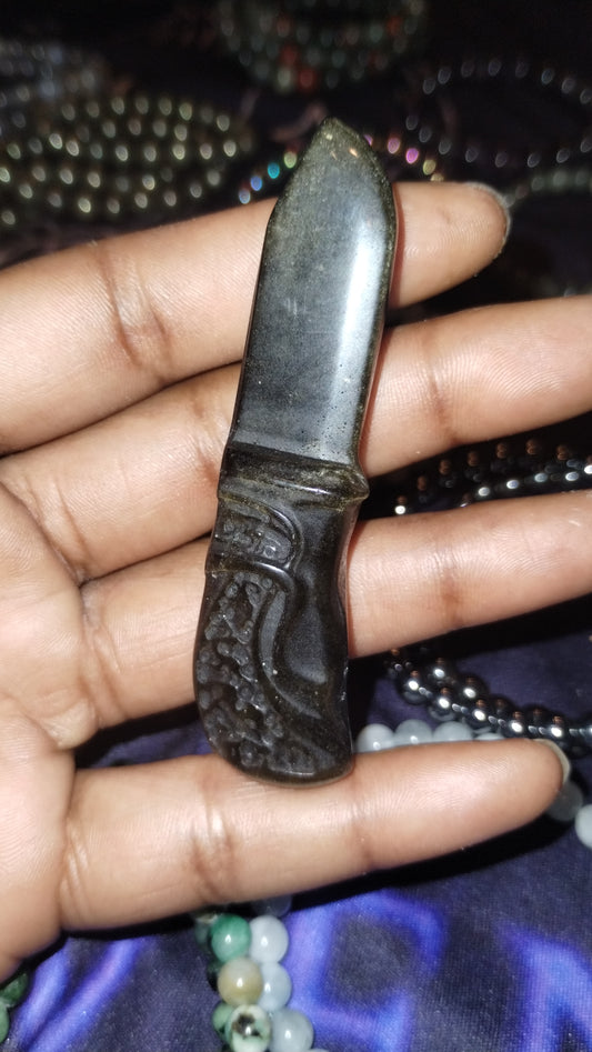 Gold obsidian knife